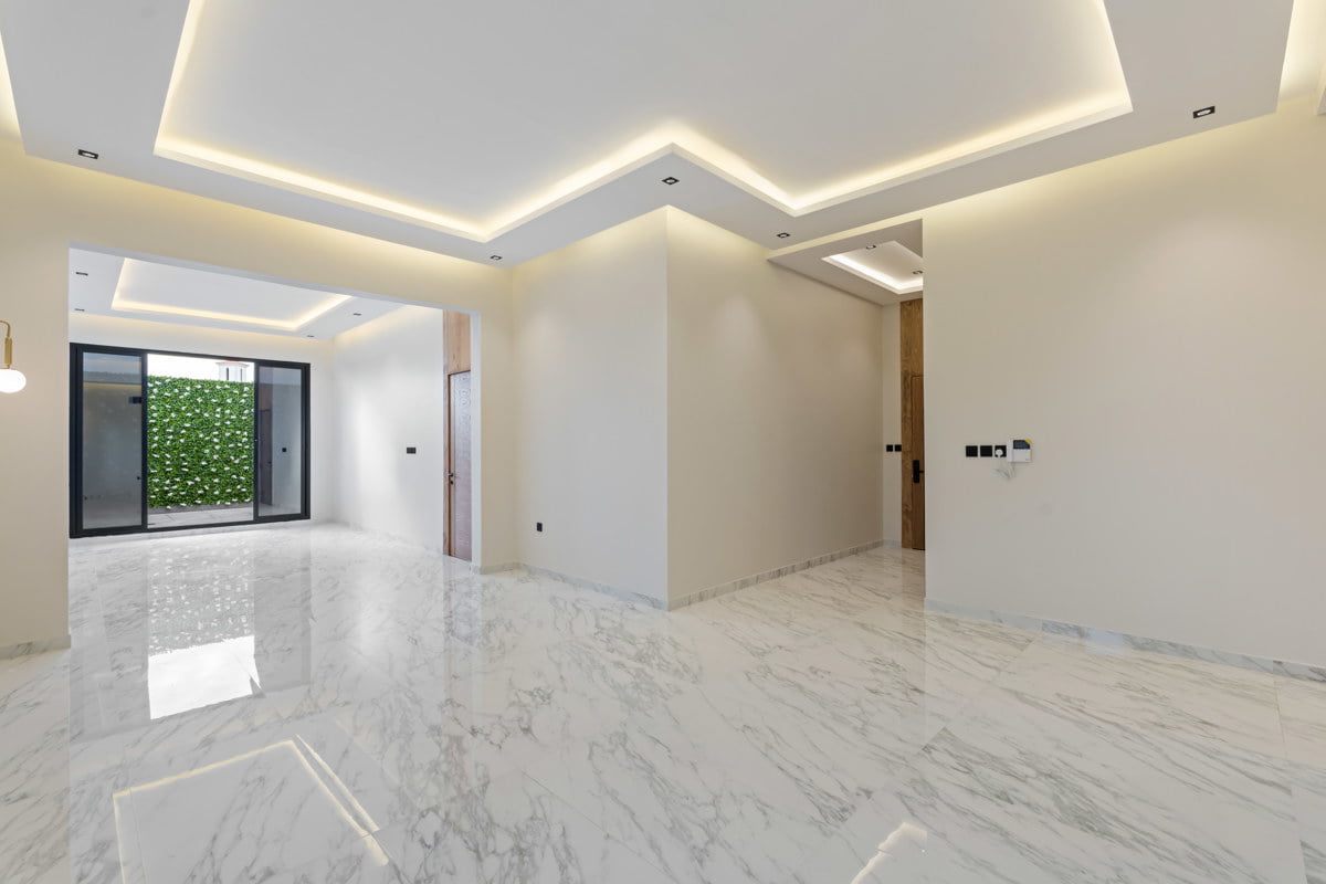 large living room with entrance to garden