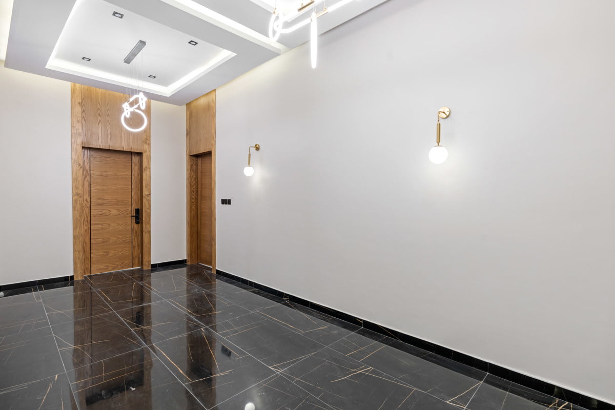 hallway entrance with wooden doors